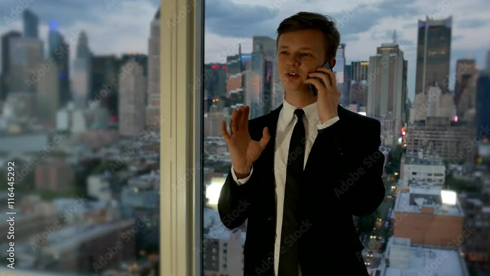 young caucasian businessman dancing in modern office. lifestyle background young caucasian businessman dancing in modern office. lifestyle background