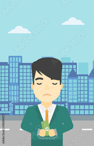 Businessman handcuffed for crime.