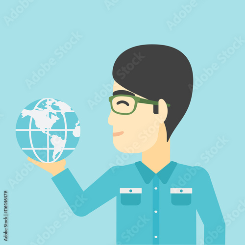 Businessman holding Earth globe.