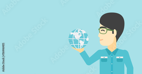 Businessman holding Earth globe.