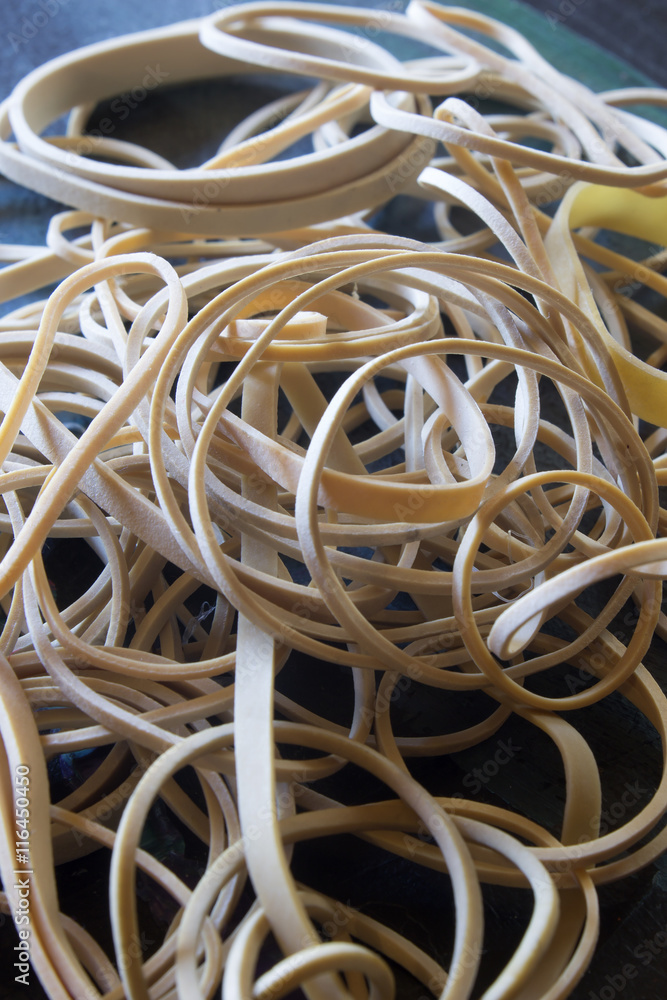 This is a photograph of rubber bands placed on a table