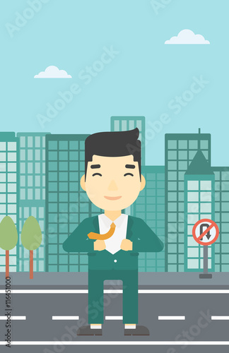 Business man opening his jacket like superhero.