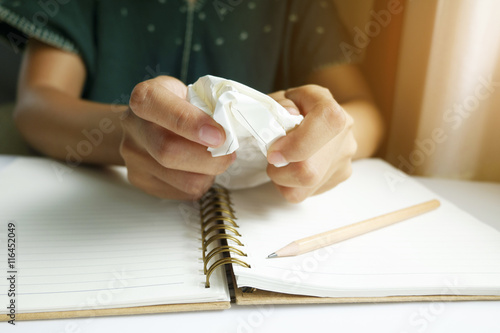 woman hands make up set with  paper and making paper ball