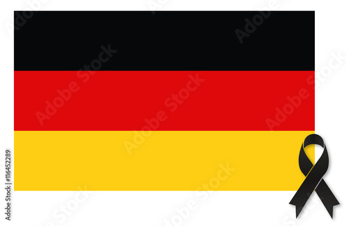 Germany terror - black ribbon condolence on german flag vector photo