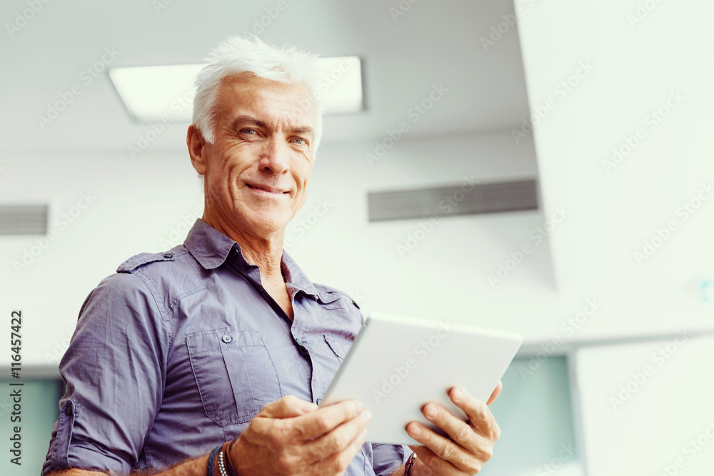 Handsome businessman in office Handsome businessman in office