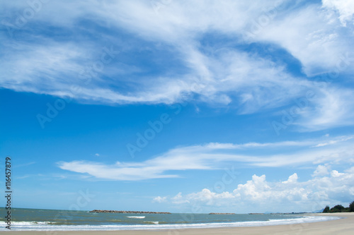 sky blue and white clouds on the beach