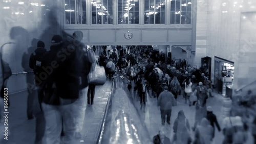 commuters walking through city train station. time lapse of people rushing