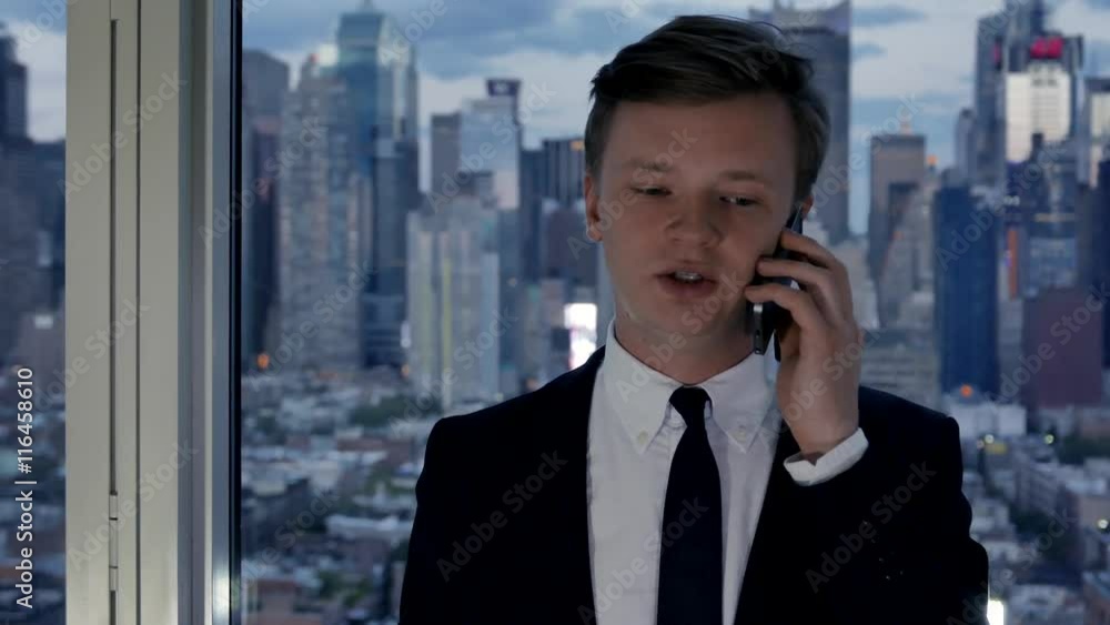 young caucasian entrepreneur working in office. business people background