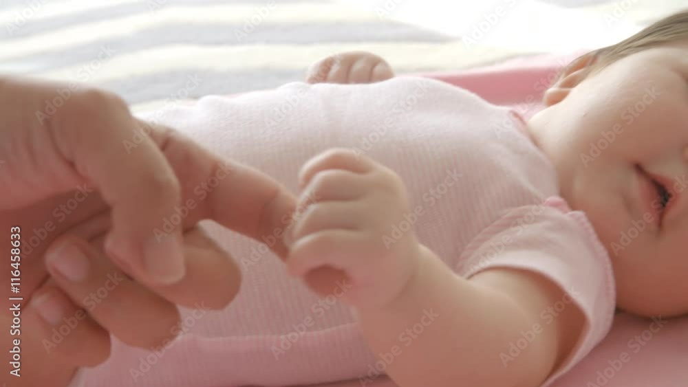 Baby Girl Laying On Pink Blanket Shot In Slow Motion Baby Girl Laying On Pink Blanket Shot In Slow Motion