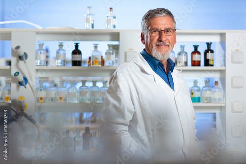 Senior chemistry professor/doctor in a lab 