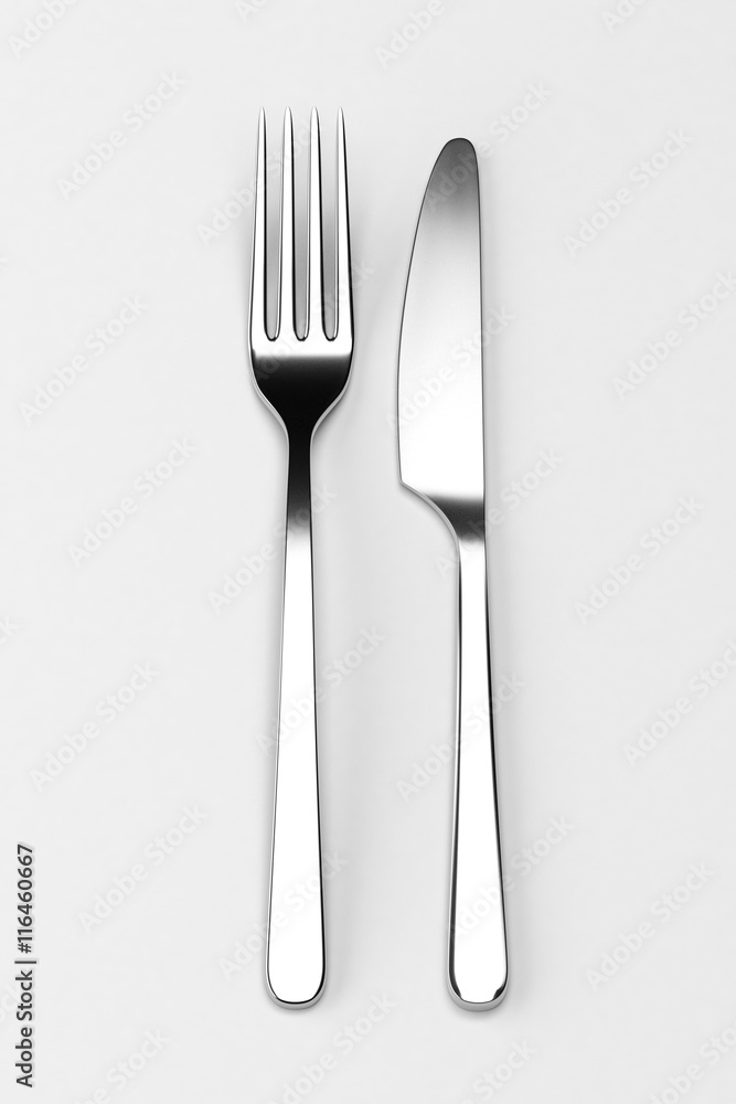 Fork and knife on grey Fork and knife on grey