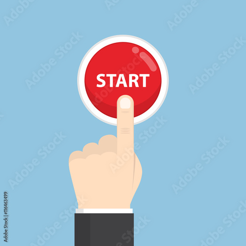 Businessman hand pressing start button