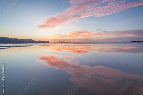 Reflection Sunrise or Sunset View With Orange Cloud and Blue Sky