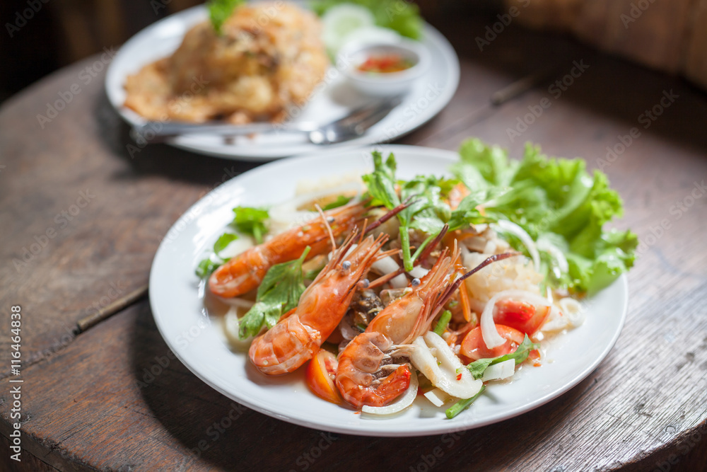 seafood salad on wooden table