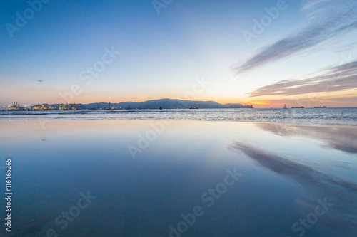 Reflection Sunrise or Sunset View With Orange Cloud and Blue Sky