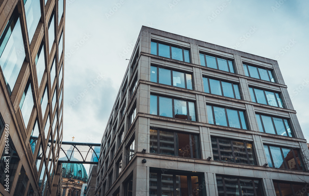 Modern commercial building with sky reflections Modern commercial building with sky reflections