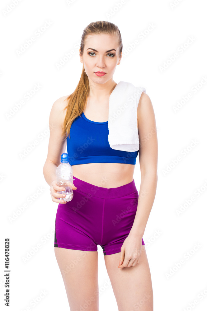 Young healthy fitness girl with bottle of water isolated on white background Young healthy fitness girl with bottle of water isolated on white background