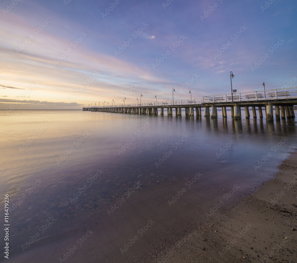 Seascape,sunset, wooden pier on the Baltic Sea, Gdynia Orłowo, Poland

