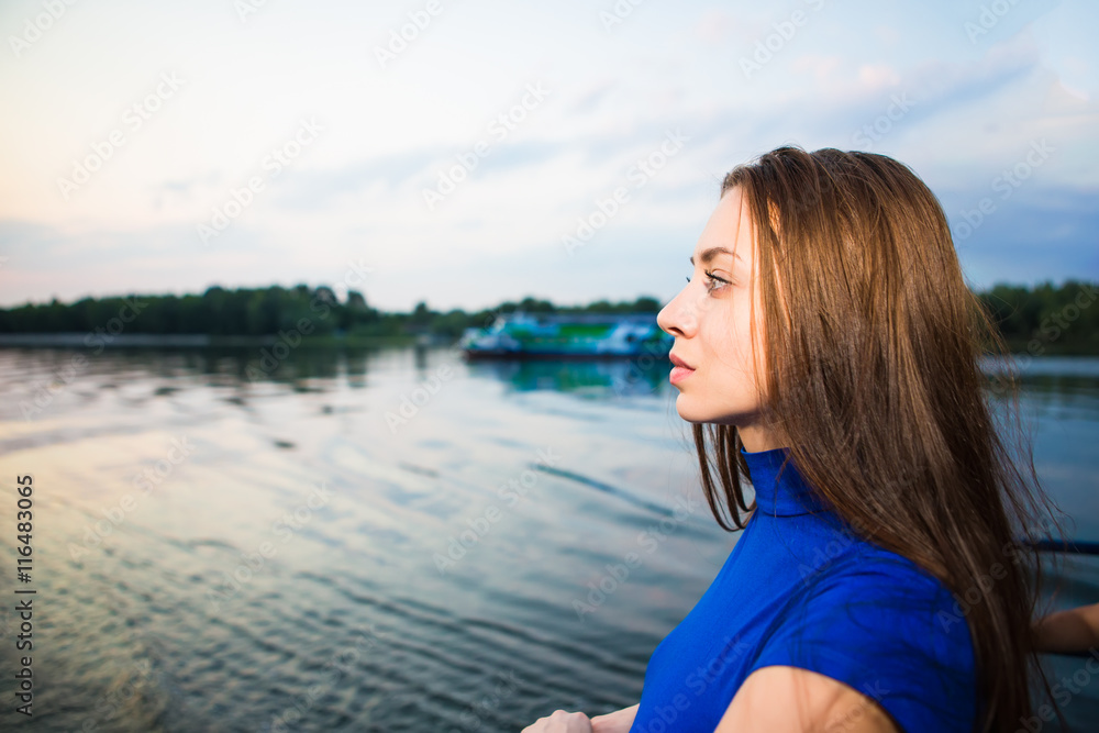 Portrait of beautiful pensive young brunette