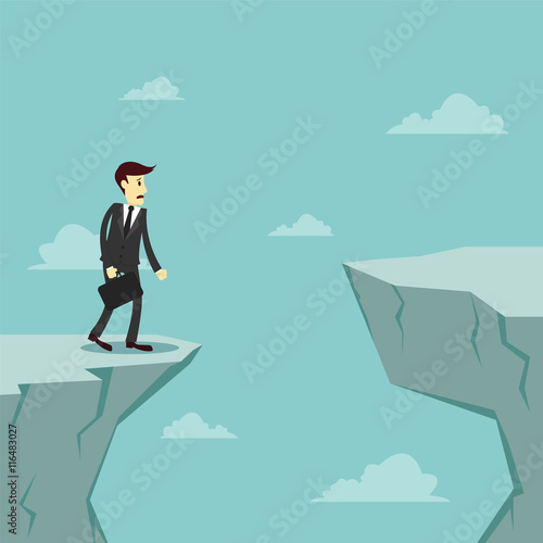 Businessman worry about how to cross over the gap of cliff