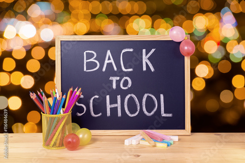 education concept with text back to school is written in chalkbo photo