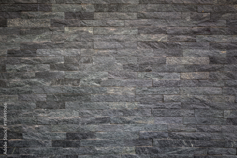 Obraz premium Pattern of black slate wall texture for background