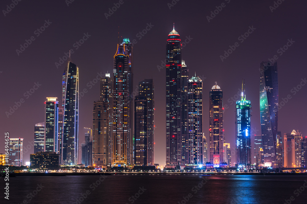 Naklejka premium Night cityscape of Dubai city, UAE