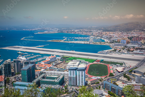 an aerial view of Gibraltar, its marina and the Mediterranean se