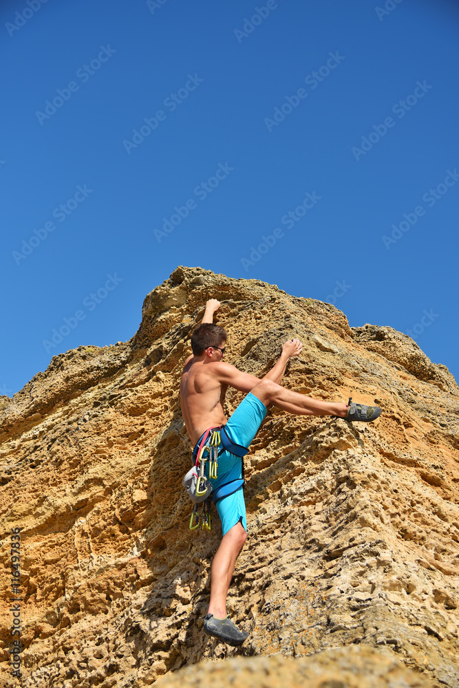 extreme man climbing up