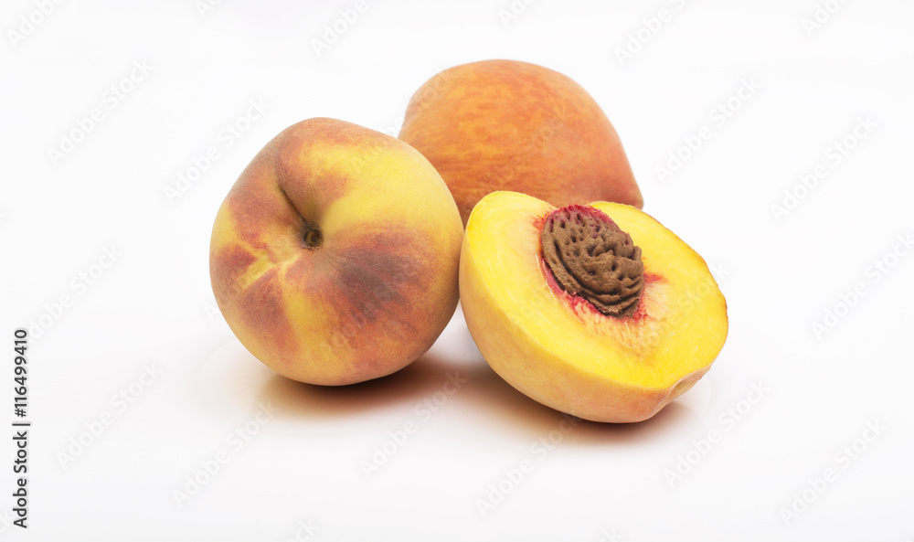 Three peach fruits with leaf isolated on white background Three peach fruits with leaf isolated on white background