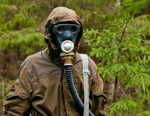 the man in the gas mask in the forest