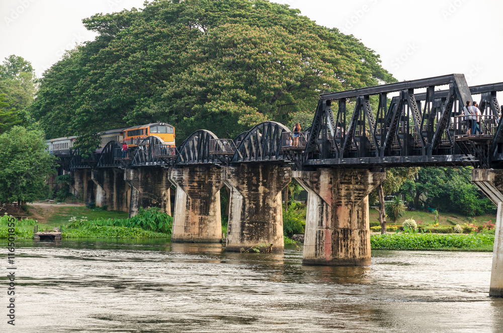 Fototapeta premium Trains for travel running on the old bridge over the River Kwai Yai is a historical attractions during World War 2 the famous of Kanchanaburi Province in Thailand