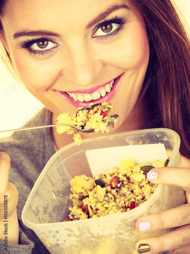 Woman eat oatmeal with dry fruits. Dieting Woman eat oatmeal with dry fruits. Dieting