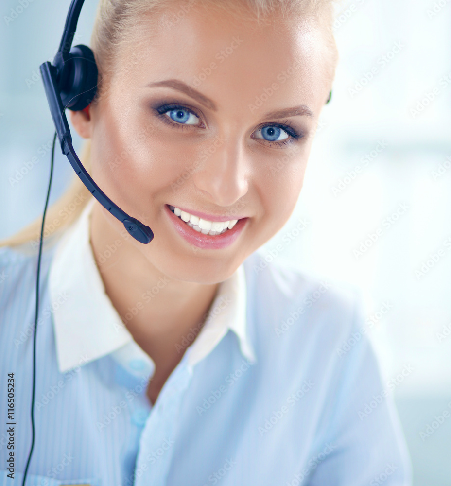 Close-up portrait of a customer service agent sitting at office Close-up portrait of a customer service agent sitting at office