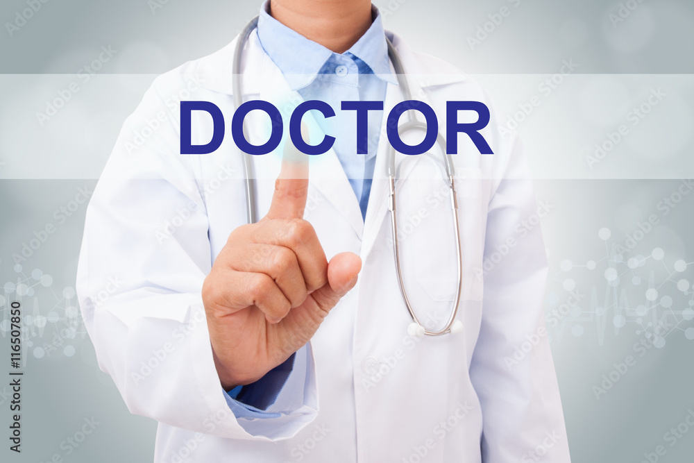 Doctor hand touching DOCTOR sign on virtual screen. medical concept Doctor hand touching DOCTOR sign on virtual screen. medical concept