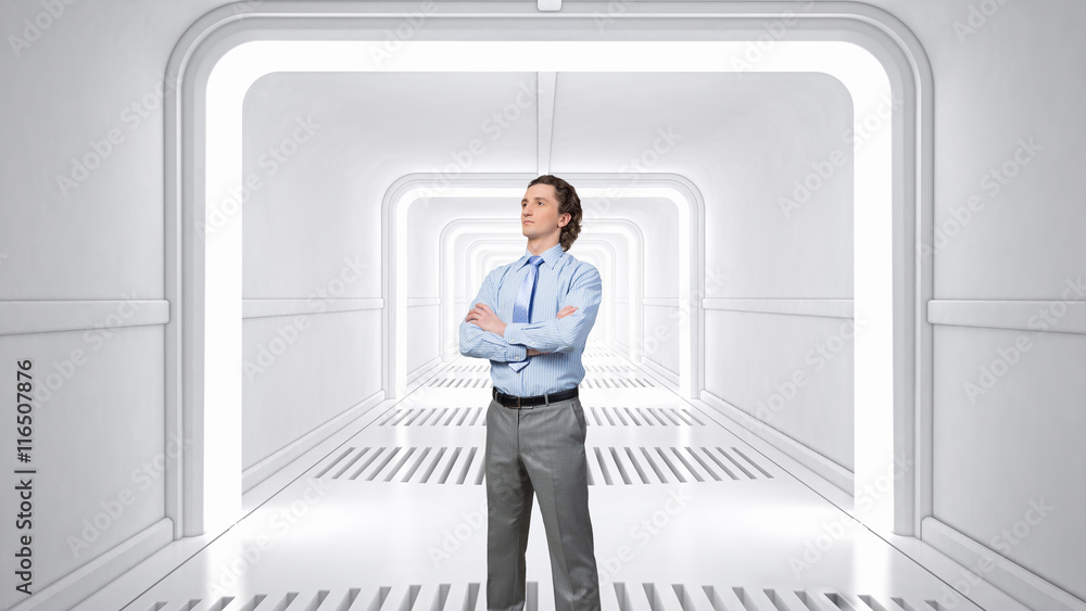 Man in futuristic interior . Mixed media Man in futuristic interior . Mixed media