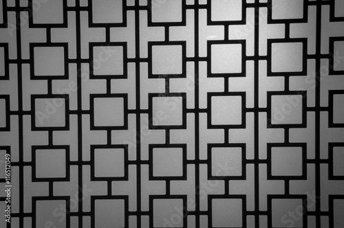 Fototapeta Naklejka Na Ścianę i Meble -  Black and white pattern on glass