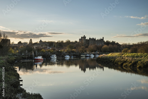 Landscape image of old medieval Castle viewed across River at su © veneratio