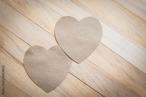 background with wooden hearts, place for text