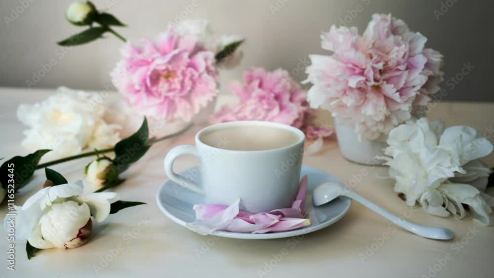 fresh cappuccino in the white cup, still life with peonies. HD cinemagraph - motion photo seamless loop fresh cappuccino in the white cup, still life with peonies. HD cinemagraph - motion photo seamless loop