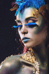 Fototapete Frauen Elfenhafte Frau mit Körperbemalung  © kuzmichstudio