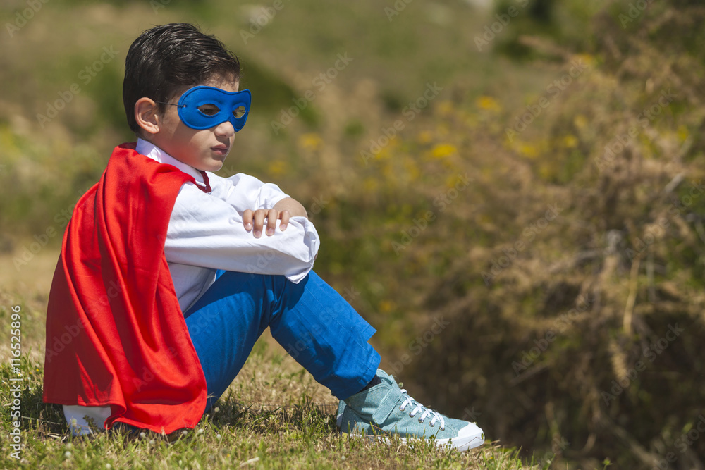 Naklejka premium Little Superhero resting