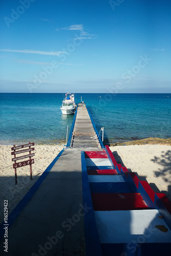 Pier for boats on beach