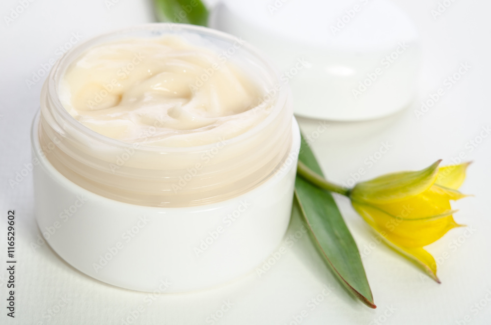 Jar of beauty cream with cap with tulips Jar of beauty cream with cap with tulips