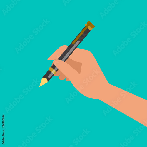 Hand holding pen and writing