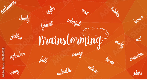Word brainstorming with brain and a lot of words associated with autumn on triangular low poly backdrop