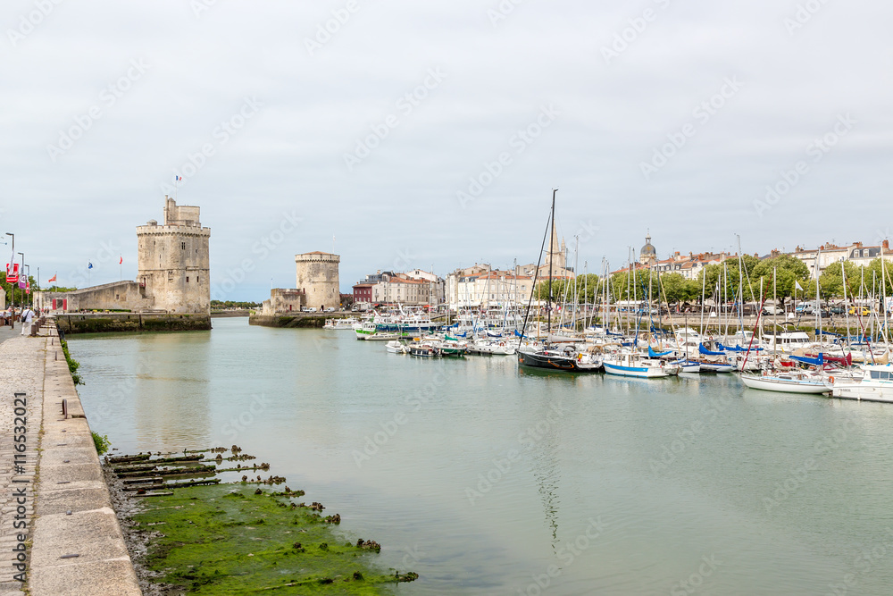 La Rochelle, France. Old Port and the medieval watchtowers. Left -. St. Nicholas Tower, 1345-76 years. Right - Chain Tower, 1382-90 years. UNESCO list