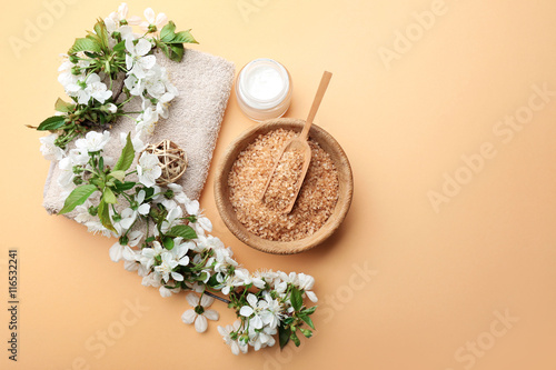 Wallpaper Mural Spa treatment with blooming branch on beige background Torontodigital.ca