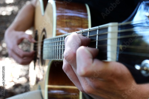 footsteps on a sandy beach © almaholm