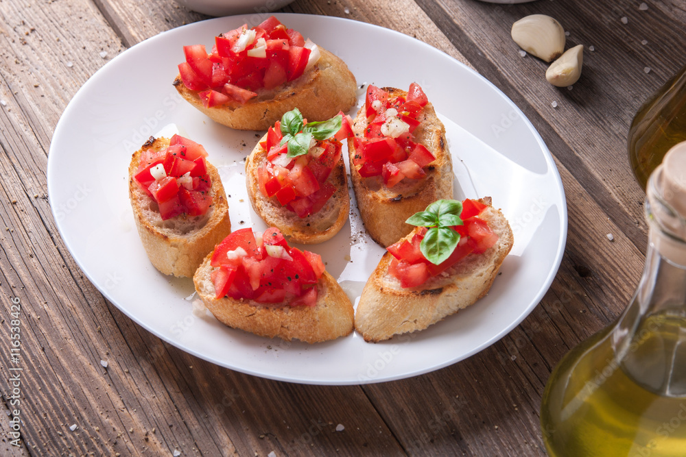 Bruschetta with tomato, onion and basil